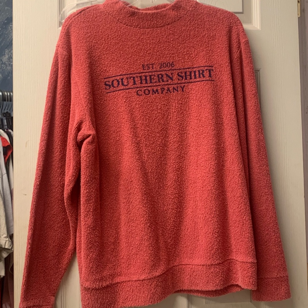 reddish pullover